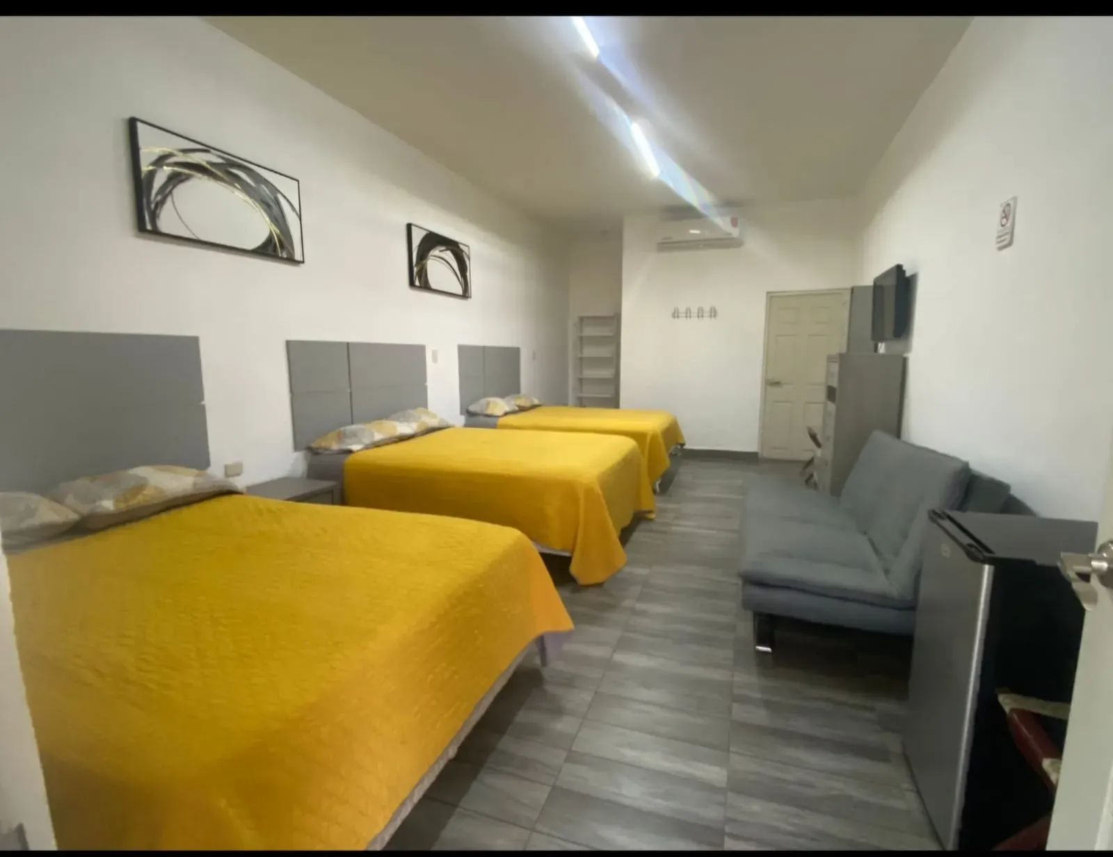 Recámara del departamento para estancias largas, Hotel Los Arcos Inn